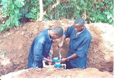 MUWSA Workers Installing Water Meters